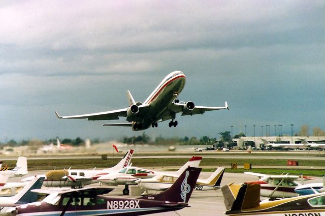 Boeing MD-11 (N1754) - KSJC- 12 R departure this day for the Tokyo - Narita bound MD-11. Note I am standing at the end of the runway - this before SJC extended the runways. This MD-11 would use a lot of runway. I was also able to get many years of MD-11 video at SJC. Date apprx 1994 1995