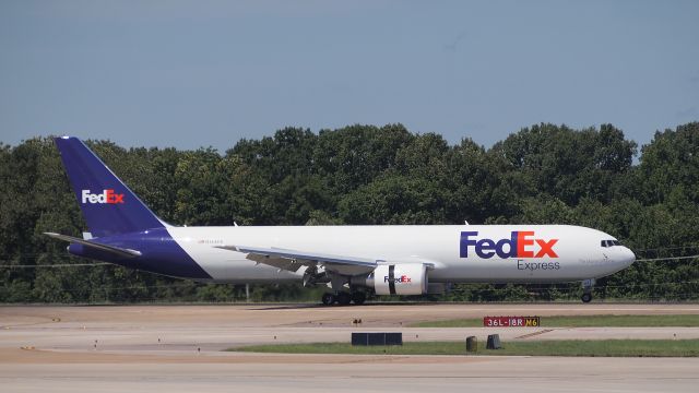 BOEING 767-300 (N144FE) - Just after touchdown on 36L.