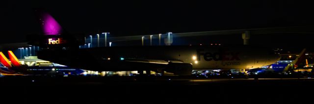 Boeing MD-11 — - FedEx MD11 taxiing at PHX on 8/31/22. Taken with a Canon 850D and Rokinon 135mm f/2 manual focus lens.