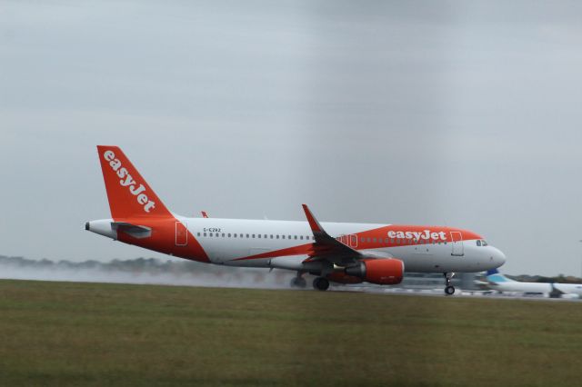 Airbus A320 (G-EZRZ) - An EasyJet A320 taking off from runway 22 at London Stansted Airport.br /br /Location: London Stansted Airport.br /Date: 12.10.22 (dd/mm/yy).