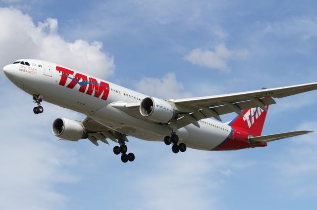 Airbus A330-200 — - TAM A330-200 landing on runway 027L at LHR.