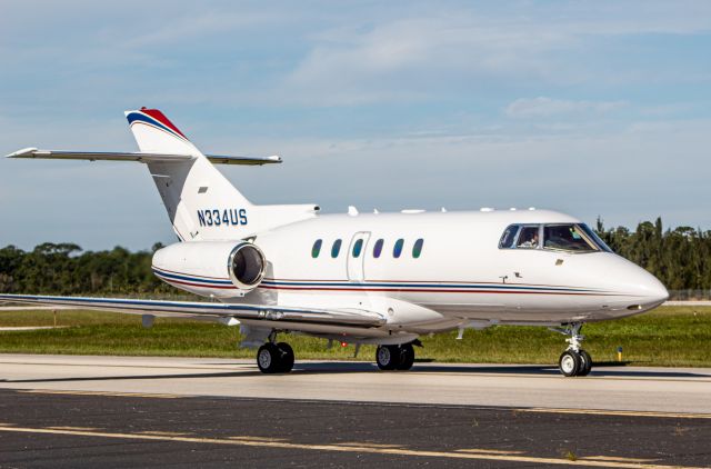 Hawker 800 (N334US) - HAWKER 850XP taxing to Sun Jet Center FBO.