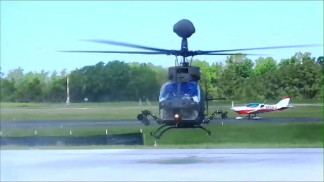 — — - US Army 82nd. CAB OH-58 Kiowa executing pedal turn for ramp positioning to refuel at Grand Strand Airport (KCRE) in North Myrtle Beach, SC on 4/21/2015.