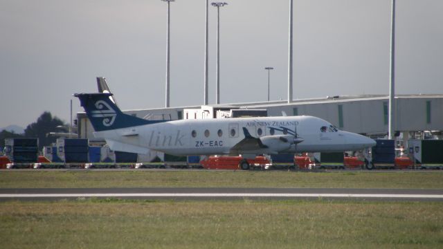 Beechcraft 1900 (ZK-EAC) - Final landing of Beech 1900Ds at Christchurch. This aircraft departed NZCH bound for Hokitika which was the final takeoff at Christchurch.
