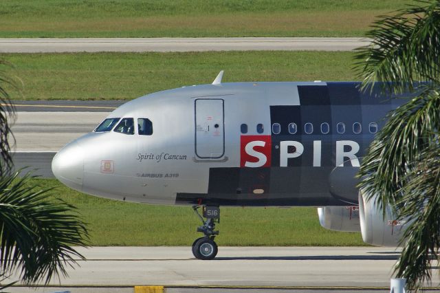 Airbus A319 (N516NK) - "Spirit of Cancun" on taxi amongst the Florida palms