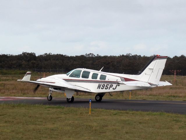 Beechcraft Baron (58) (N95PJ) - Take off runway 24.