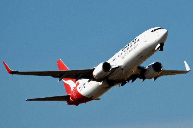 Boeing 737-800 (VH-VYC) - Heading skywards off runway 23. Thursday 4th April 2013.