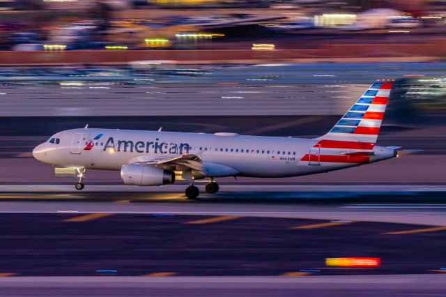 Airbus A320 (N663AW) - An American Airlines A320 landing at PHX on 2/1/23. Taken with a Canon R7 and Tamron 70-200 G2 lens.