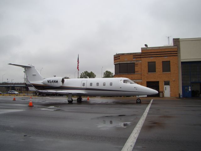 Learjet 55 (N54NW) - Brandy told me this Hangar was built in 1939 and Howard Hughes had his office up stairs corner. Amelia Earhart flew in and out of here. TWA operated from Robert B. Wheeler Kansas City down town airport. Very unique history at this airport.