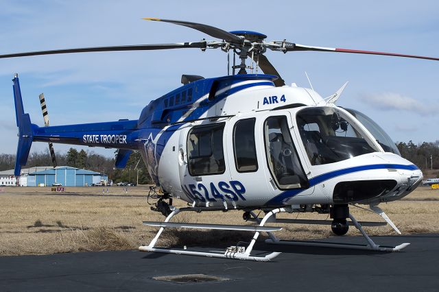 Bell 407 (N524SP) - Assisting with a SAR mission, Trooper 4 sits on the tarmac, awaiting its next tasking. February 2014