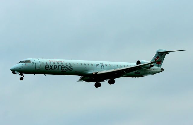 Canadair Regional Jet CRJ-900 (C-FDJZ) - Approaching rwy 25R from St. Johns Intl Airport.