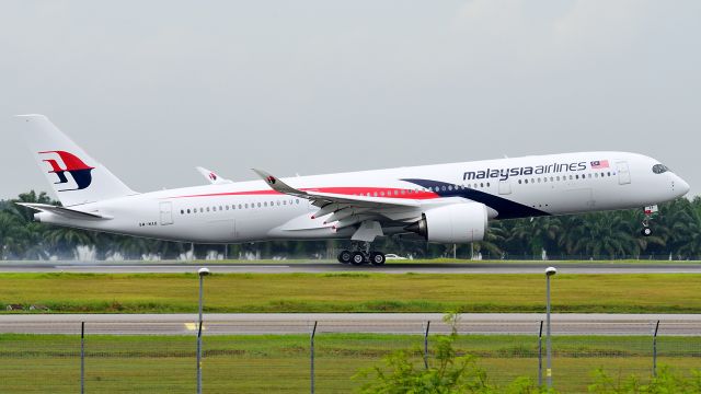 Airbus A350-900 (9M-MAB) - Malaysia Airlines first Airbus A350-900 touches down on runway 32L on a rainy day, following its delivery flight from Toulouse.