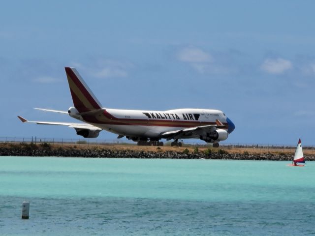 Boeing 747-400 (CKS423) - CKS423 headed to Runway 8R for departure. This particular plane is sporting a face mask, which is what caught my attention. Apologies for the low quality photo, I was out running when I saw the plane and sprinted to my car to get my phone. Had to zoom in a bit. Enjoy!