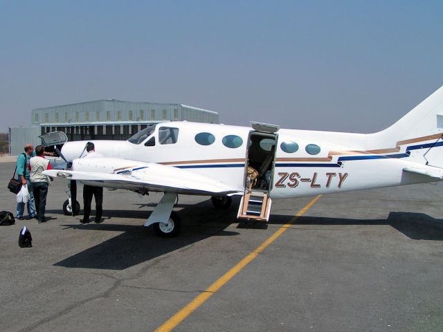 Cessna Chancellor (ZS-LTY) - At the Orapa Diamond mine, Botswana.