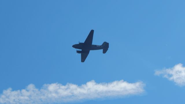 CURTISS Commando (N78774) - "Tinker Bell"-Making her first pass before the parachute drop.