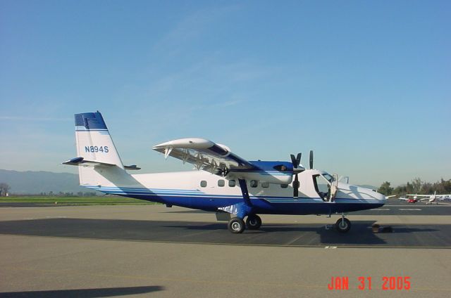 De Havilland Canada Twin Otter (N894S) - This aircraft is owned by Hewlitt Packard.  It operates a Lincoln (CA)/San Jose shuttle.  The aircraft had a mechanical problem and diverted to LVK. The pilots were pushing the aircraft to another location.  I helped them push it then took this picture.