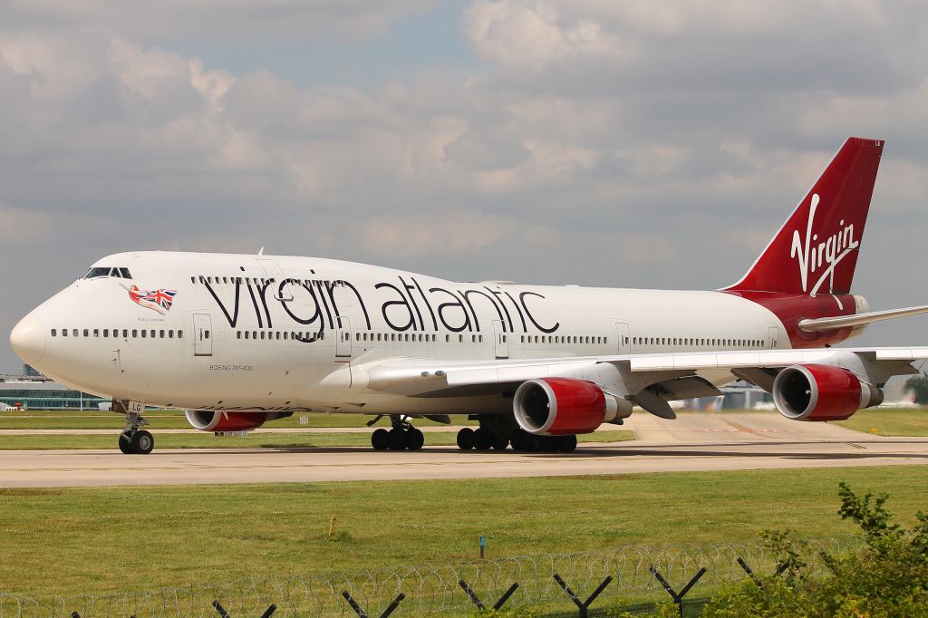 Boeing 747-400 (G-VXLG) - New York here we come! G-VXLG Virgin Atlantic Airways Boeing 747-400 starting its takeoff run on Manchester's runway 23L on flight VS127 to New York JFK at 14:10 on Wednesday 24/07/19