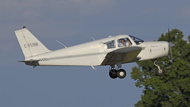 Piper Cherokee (C-FUSW) - Departing AirVenture 2023 on runway 18R 