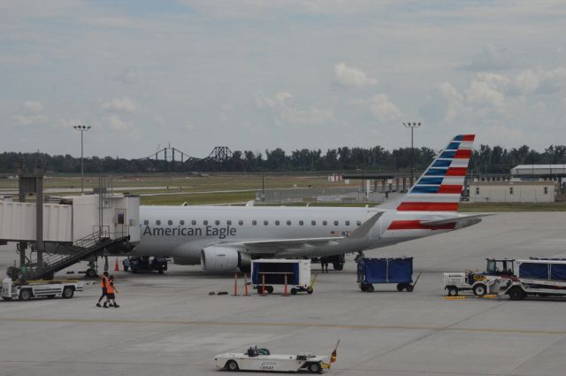 Embraer 170/175 — - American Eagle (Compass) 6099 arrived at 2:58 PM CDT and will depart out to Las Angles at 3:55 PM CDT at Omaha Eppley Airfield.  Photo taken July 28, 2017 with Nikon D3200 mounting 55-200mm VR2 lens.