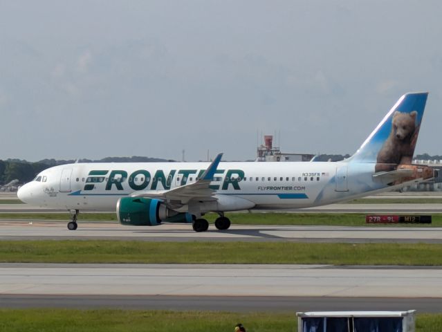 Airbus A320 (N335FR) - Photo taken from KATL Concourse E.