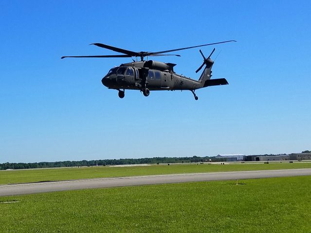 — — - I had just tied down a C172 at Baton Rouge and this helicopter was taking off on the taxiway. 