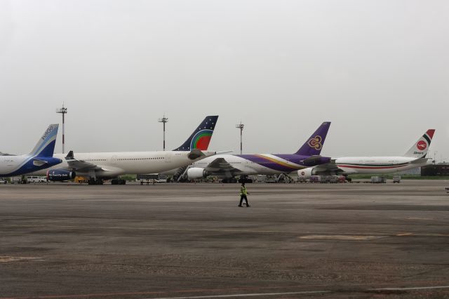 Airbus A330-300 (S2-ALB) - 28th August, 2024: Afternoon line-up of foreign and Bangladeshi wide-bodies at Dhaka's Zia International Airport. 