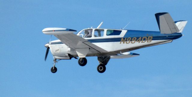 Beechcraft 35 Bonanza (N884DB) - About to touch down is this 1949 Beech A35 Bonanza in the Winter of 2025.