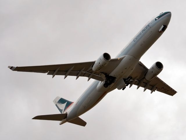 Airbus A330-300 (B-HLW) - Getting airborne off runway 23 and heading home to Hong Kong. Tuesday 27th December 2011.