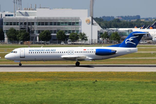 Fokker 100 (4O-AOM)