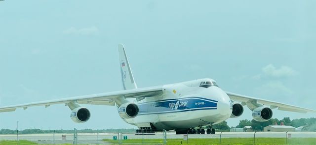 — — - Volga-Dnepr Group AirBridge Cargo An-124  the world's largest civilian cargo aircraft for air cargo transportation of oversized and super-heavy cargo. The combination of such technical characteristics as the volume of the cargo compartment, flight range, the ability to load without special loading equipment allows you to transport super-heavy and bulky cargo weighing up to 120 tons over extremely long distances. br /br /With a multi-strut chassis equipped with 24 wheels, which allows you to change the angle of the fuselage, which makes it easier to carry out loading and unloading operations.