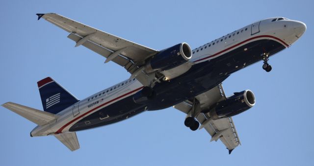 Airbus A320 (N669AW) - Operating as AA # 597 (Post merger) on final from KPHX  06-17-2015