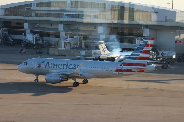 Airbus A319 (N5007E) - 121013 Start-up after pushback from northside of Term C