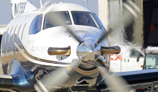 Pilatus PC-12 (N475SS) - Boutique flight 383 taxing at Merced Regional Airport