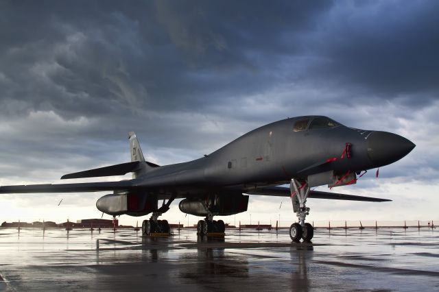 — — - A lone B1B 'Bone' sits on the ramp of McConnell AFB following a thunderstorm