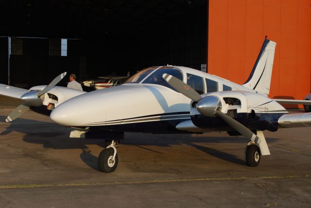 Piper Seneca (N15145) - 15145 returns after a day of multi instruction. Sun is setting at La Porte Airport