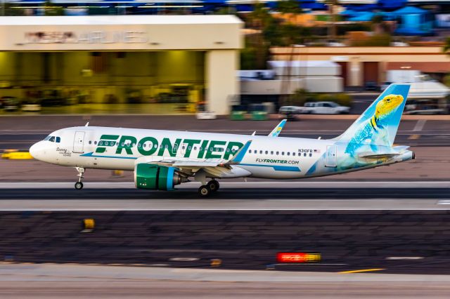 Airbus A320neo (N310FR) - Frontier Airlines A320 neo "Sunny the Collared Lizard" landing at PHX on 12/9/22. Taken with a Canon R7 and Tamron 70-200 G2 lens.