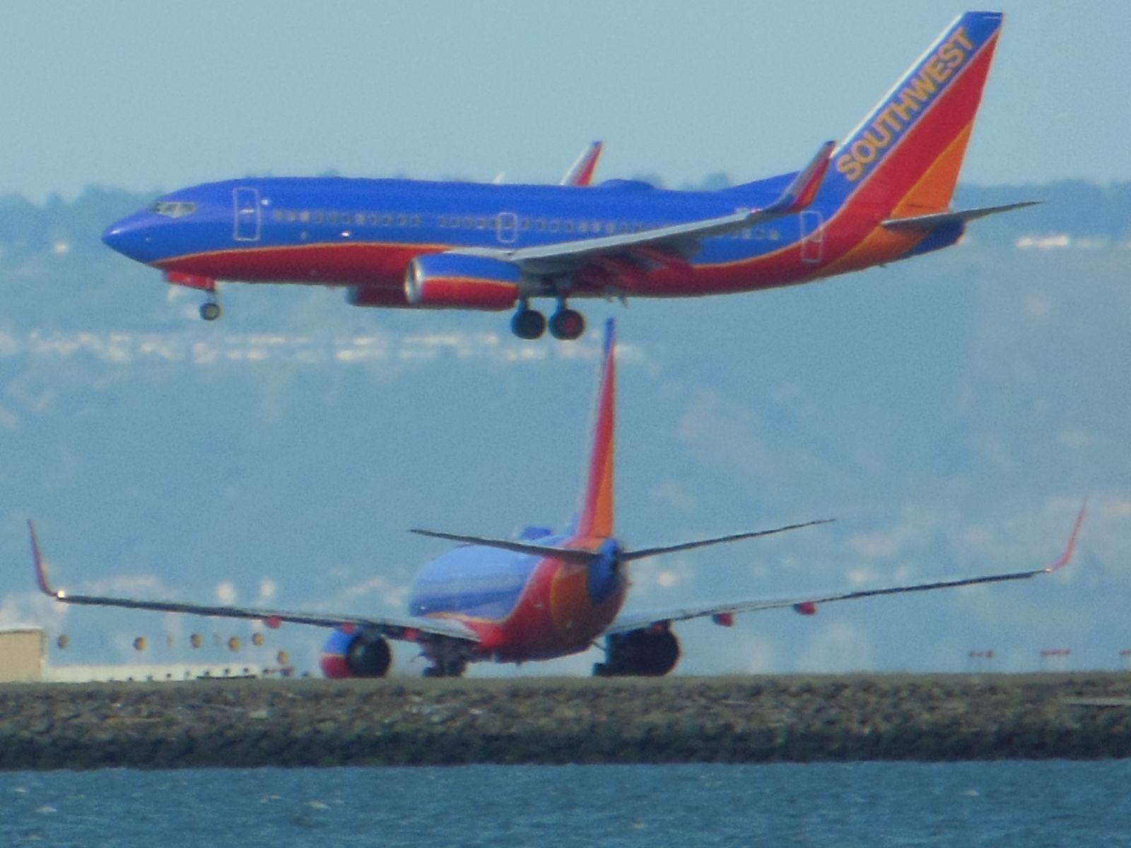 Boeing 737-800 — - Deja vu? Sorry for bad quality, shot from a $200 Nikon
