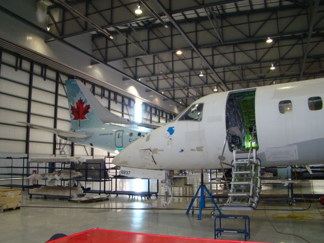 Embraer ERJ-135 — - Embraer ERJ-135 with new landing gear installed. At the Big E. The Big E is Embraer in Nashville Tn.