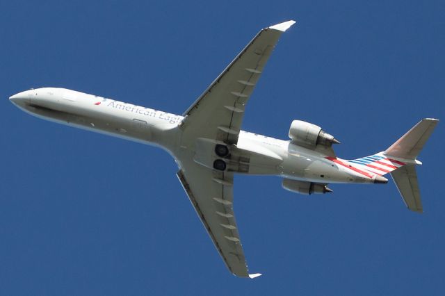 Canadair Regional Jet CRJ-700 (N525AE) - American Eagle (opby PSA Airlines) JIA5490/AA5490 to Charleston (KCHS/CHS) climbs out after a runway 1 departure. Former American Eagle Airlines, Envoy Air.br /Photo date: 3-29-24br /Upload date: 1-8-25