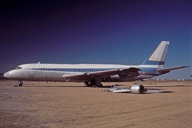 N812AJ — - Convair Cv-880 N812AJ at the Mojave Airport on September 10, 2001. Its Convair construction number is 22-00-23. It was delivered to TWA as N817TW in 1960 and immediately leased to Northeast Airlines. Warner Brothers bought it in 1990. Its left wing tip was removed during filming of a runway collision for the movie The Rookie, which featured Clint Eastwood and Charlie Sheen.