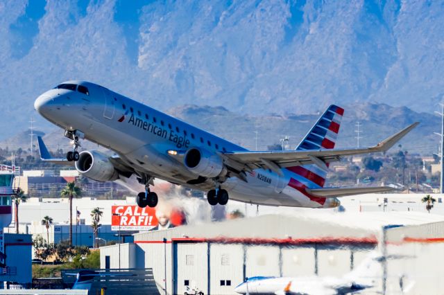 Embraer 175 (N208AN) - An American Eagle ERJ175 taking off from PHX on 2/10/23 during the Super Bowl rush. Taken with a Canon R7 and Canon EF 100-400 II L lens.