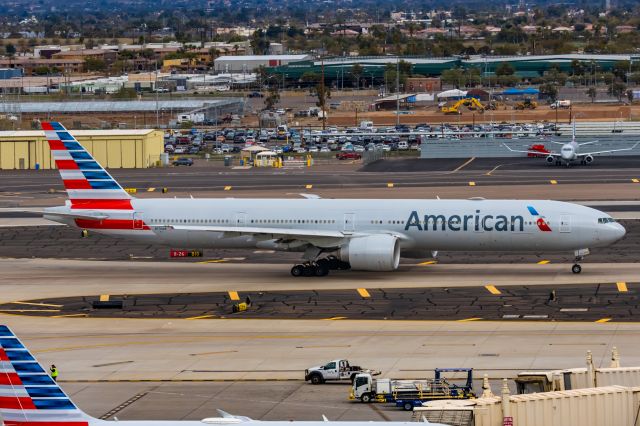 BOEING 777-300ER (N734AR) - An American Airlines 777-300ER taxiing at PHX on 2/14/23. Taken with a Canon R7 and Canon EF 100-400 II L lens.