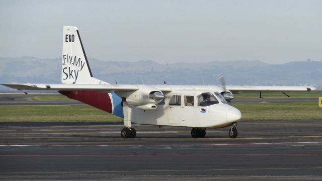 ROMAERO Islander (ZK-EVO) - EVO manoeuvring to a gate to pick up just one passenger to the Barrier.