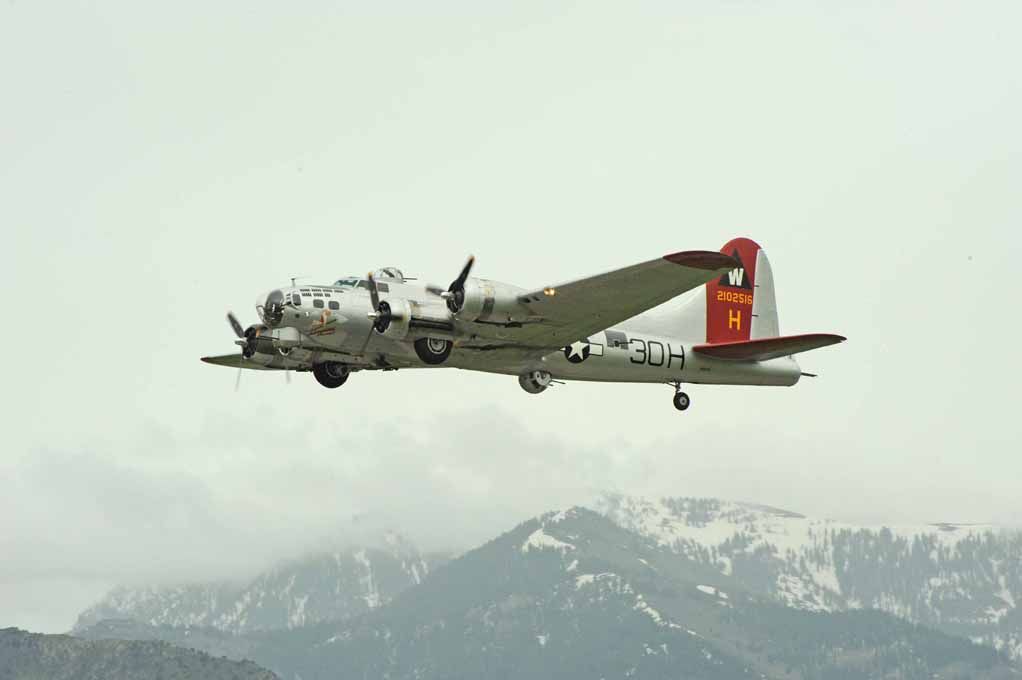 Boeing B-17 Flying Fortress (21-0256) - Departing Logan-Cache in rain, Photo use by permission of the photographer; Clark Salisbury . Salisbury Photography  North Logan, Ut