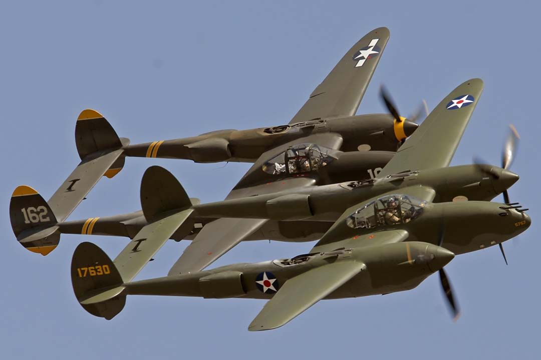 Lockheed P-38 Lightning (N17630) - Lockheed P-38F Lightning NX17630 Glacier Girl and Lockheed P-38J Lightning NX138AM 23 Skidoo at the Planes of Fame air show at Chino, California on May 19, 2007.