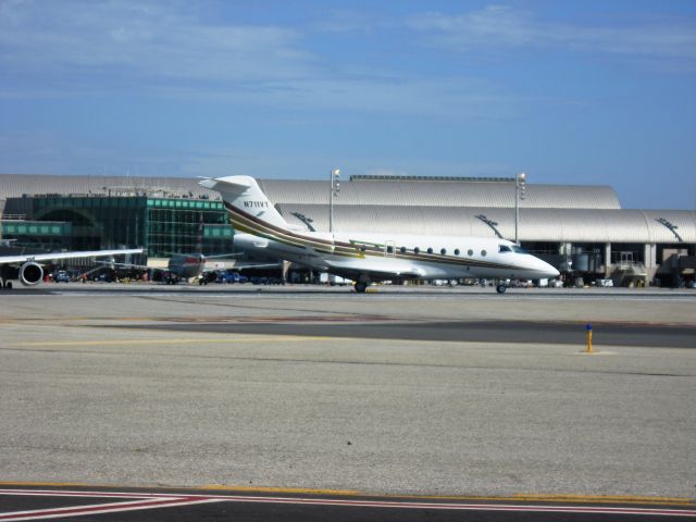 IAI Gulfstream G280 (N711VT) - Awaiting takeoff on RWY 19R