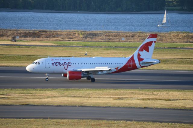 Airbus A319 (C-GITR) - ROU1841 vacating 28R after arriving from Toronto-Pearson (CYYZ/YYZ). This marks Air Canada's reinstatement of their seasonal-daily flights between Portland, Oregon and Toronto for 2019. This flight also marks first day of Air Canada Rouge operations into PDX as this route was previously operated by Air Canada's mainline E-190s. Air Canada announced the transfer of the PDX-YYZ route to their Rouge subsidiary in March 2019.