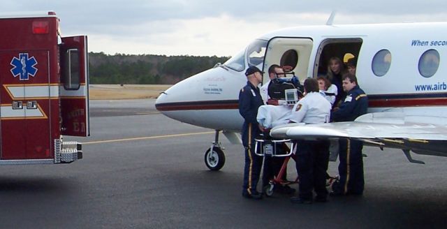 Mitsubishi MU-300 Diamond (N110DS) - Loading a patient at RDU onto Airborne Critical Care, LLCs MU-300 aircraft AKA Critical Care One priot to departure to FLL.