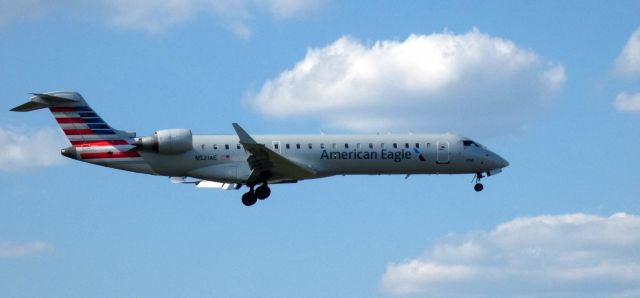 Canadair Regional Jet CRJ-700 (N521AE) - On short final is this 2004 American Airlines Eagle Canadair Regional Jet 701ER in the Spring of 2023.