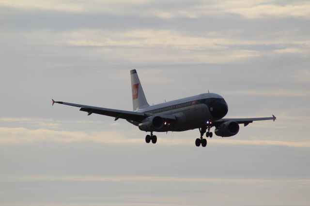 Airbus A319 (G-EUPJ) - A BA A319, wearing the 'BEA' livery, on final approach into LHR, landing on runway 27R. br /br /Location: Stanwell Moor Road (LHR), beside runway 27R.br /Date: 21.08.22 (dd/mm/yy)